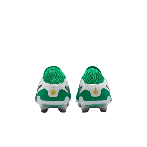 Back view of a pair of green and white Nike Phantom football boots featuring a yellow logo on the heel against a plain white background.