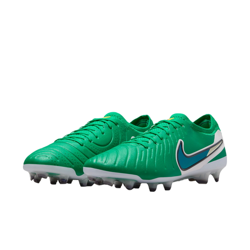 Pair of green Nike soccer cleats with a textured upper, white and blue swoosh logo, and clear studs on a white background.