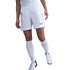 Lower half of a person wearing white Nike soccer shorts, knee-high socks, and cleats against a white background.