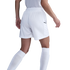 Rear view of a person wearing white athletic shorts, a jersey, and knee-high socks.