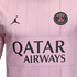 Close-up of a light pink PSG soccer jersey with vertical pinstripes, the Jordan logo, club crest, and "QATAR AIRWAYS" sponsor name.