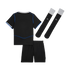 A three-piece black football kit featuring the back of a jersey with blue trim and white collar, matching shorts, and black socks with white tops and "CFC" branding.