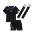 Kids' black Nike Chelsea FC football kit featuring a jersey, shorts, and socks with blue and silver accents, showcasing the club crest and white Nike logos.