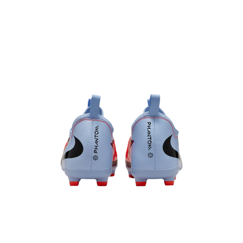 Rear view of light blue Nike Phantom soccer cleats with red studs and black branding on a black background.