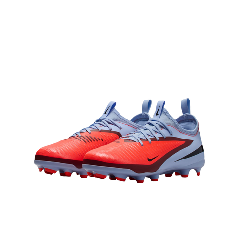 Pair of light blue and bright orange Nike soccer cleats with textured uppers and orange studs, set against a solid black background.
