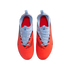 Top-down view of Nike soccer cleats with a bright orange forefoot, light blue laces and upper, and red interior, isolated on a black background.
