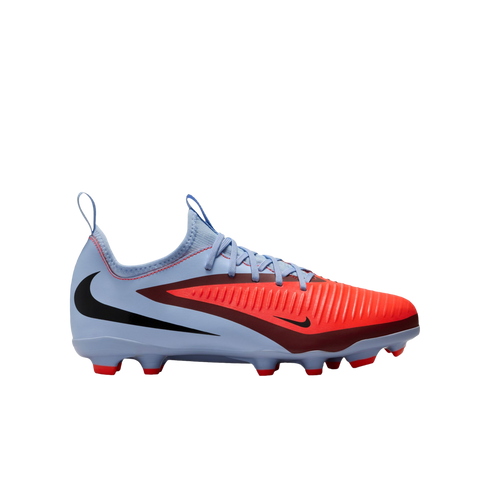 Light blue and bright orange Nike soccer cleat shown in profile against a black background. A large black Nike swoosh is on the heel and a smaller black swoosh is on the toe.