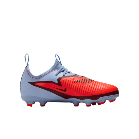 A profile shot of a Nike soccer cleat with light blue, bright red, and dark burgundy accents, set against a solid black background.