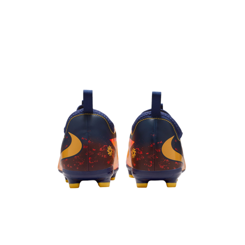 Rear view of two dark blue and orange soccer cleats with yellow swoosh logos and yellow studs against a black background.
