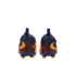 Rear view of two dark blue and orange soccer cleats with yellow swoosh logos and yellow studs against a black background.