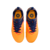 Top-down view of a pair of bright orange and navy blue Nike Phantom soccer cleats on a black background.