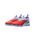 Pair of Nike turf soccer shoes in vibrant orange and light blue with black accents, shown against a solid black background.