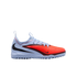 A light blue and bright orange Nike turf soccer shoe with a textured front, black swoosh, and speckled rubber sole.