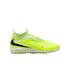 A bright neon yellow laceless Nike turf soccer shoe featuring a large black swoosh on the side and a textured rubber outsole.