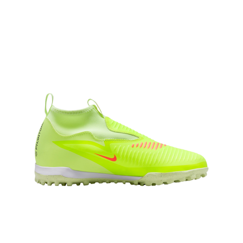 A neon yellow Nike Phantom soccer shoe for turf surfaces, featuring a sock-like collar, textured upper, and orange accents on a black background.