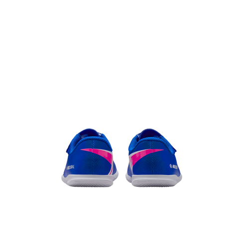 Rear view of two blue Nike Mercurial soccer shoes with pink graphics and white soles, centered on a black background.