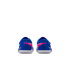 Rear view of two blue Nike Mercurial soccer shoes with pink graphics and white soles, centered on a black background.