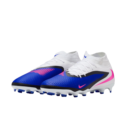 Nike Phantom soccer cleats in blue, white, and pink with a sock-like collar, shown against a black background.
