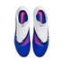 Overhead view of a pair of white and blue Nike Phantom soccer cleats with pink accents and white laces against a black background.