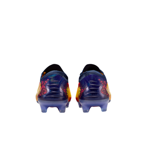 Rear view of two soccer cleats with dark blue, pink, and yellow patterns and translucent light blue studs.