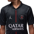 Close-up of a black Paris Saint-Germain jersey featuring the Jordan logo, PSG crest, and Qatar Airways sponsor text, with a thin red vertical line down the center.