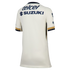 The back of a white short-sleeved soccer jersey with navy and gold sleeve trim and navy blue "telcel" and "SUZUKI" sponsor logos on the upper back.