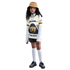 A young girl with long curly hair wearing a soccer jersey, tan bucket hat, black shorts, and white knee-high socks, standing against a plain white background.