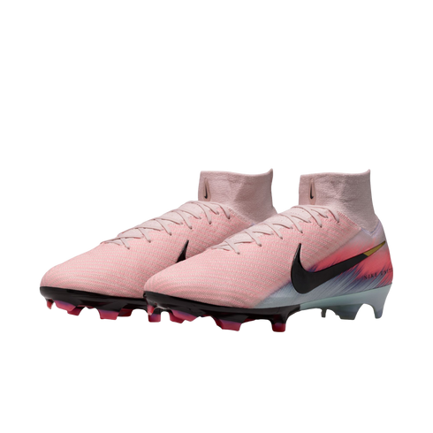 Pair of light pink Nike high-top soccer cleats with a black swoosh and colorful gradient heel on a black background.