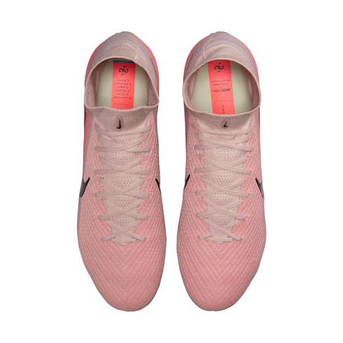 Top-down view of pink Nike Mercurial soccer cleats on a black background, featuring a textured upper, high-top collar, and black swoosh details.