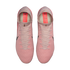 Top-down view of pink Nike Mercurial soccer cleats on a black background, featuring a textured upper, high-top collar, and black swoosh details.