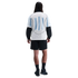 Rear view of a person with long hair in a light blue and white striped soccer jersey, black shorts, and black athletic gear against a white background.