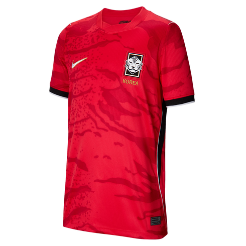 Red South Korea Nike home soccer jersey with a tonal abstract pattern, gold Nike logo, and national team crest on the chest.