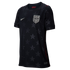 A dark navy Nike USA soccer jersey with a subtle tonal star pattern, featuring the white national team crest, Nike swoosh, and thin red accents.