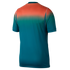 A rear view of a short-sleeved athletic jersey with a color gradient fading from bright orange at the shoulders to deep teal at the bottom, set against a solid black background. Small white piping details are visible along the sides.
