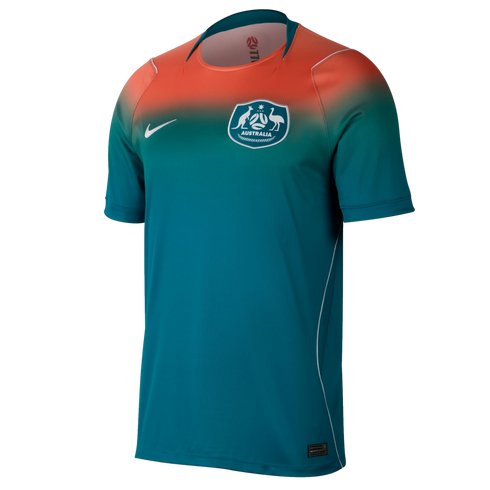 A Nike Australia soccer jersey featuring a bright orange to teal color gradient from the shoulders down. It displays the Australian national team crest on the left chest and a white Nike swoosh on the right.