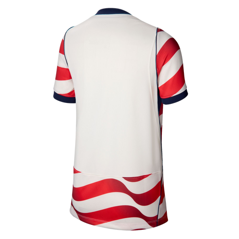 Back view of a white soccer jersey with red and white striped sleeves and a wavy striped bottom panel. Features navy blue trim on the collar and cuffs.