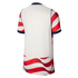 Back view of a white soccer jersey with red and white striped sleeves and a wavy striped bottom panel. Features navy blue trim on the collar and cuffs.