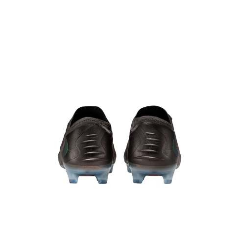 Rear view of black soccer cleats with iridescent accents and translucent blue studs, set against a solid black background.
