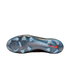 The bottom of a Nike soccer cleat featuring a translucent blue soleplate with studs and a red Nike swoosh logo against a black background.