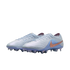 A pair of light blue Nike Tiempo soccer cleats with a metallic rose gold swoosh logo, positioned against a solid black background.