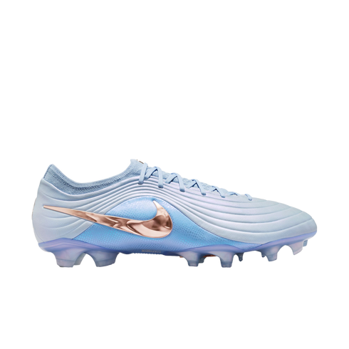 Side profile of a light blue Nike soccer cleat featuring a metallic copper swoosh, against a solid black background.