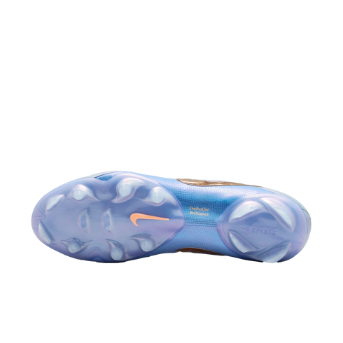 Soleplate of a blue iridescent Nike soccer cleat featuring studs and an orange swoosh logo.