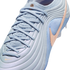 Close-up of a light blue Nike soccer cleat featuring a textured wavy upper, a rose gold Swoosh, and light blue laces against a black background.