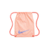 A pink Nike drawstring gym bag with a light blue swoosh logo and repeating text pattern, set against a black background.