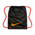 Black Nike drawstring bag with bright orange straps and a large gold swoosh. Features a repeating tonal pattern of "Nike" and "football" in various languages.