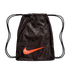 Black Nike drawstring bag featuring a repeating multilingual pattern and a large, bright orange swoosh logo on the lower front.
