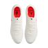 Top-down view of white soccer cleats with red insoles featuring Jumpman and Nike logos, isolated on a white background.