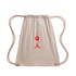 A light tan suede drawstring bag with a red embroidered Jordan Jumpman and a circular logo on the front, isolated on a black background.