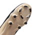 Close-up of a beige Nike soccer cleat's outsole with black studs and "NIKE CYCLONE 360" branding, shown against a solid black background.