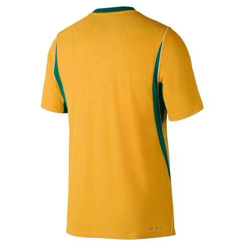 Back view of a yellow athletic jersey with green and white side panels and a green collar. The fabric has a vertical ribbed texture, and "AERO-FIT" is printed on the bottom right.